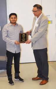 Abbas Ahmed (left) receives the Samuel J. Huang Award for Outstanding Research from IMS Polymer Program Director Mu-Ping Nieh (right)