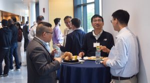 Luyi Sun and Yi Zhang with IAP guest